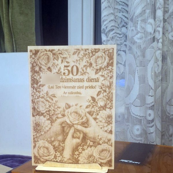 Plywood anniversary greeting — personal text hidden