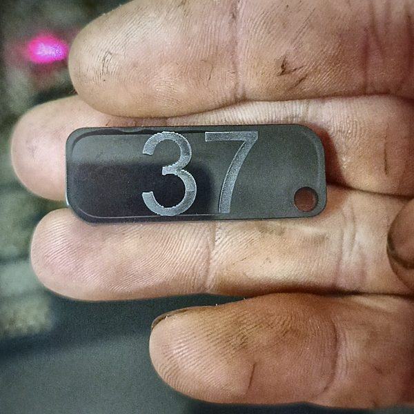 Numbered tag — close-up