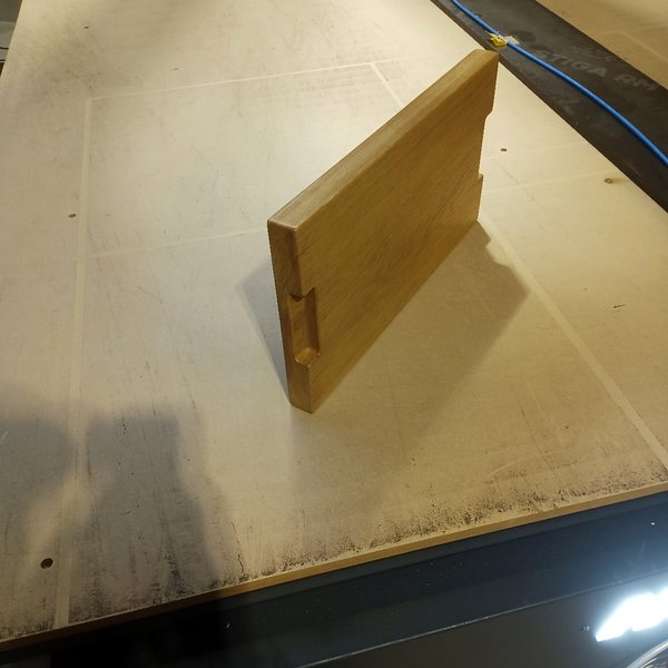 Oak board with a handle on the CNC table