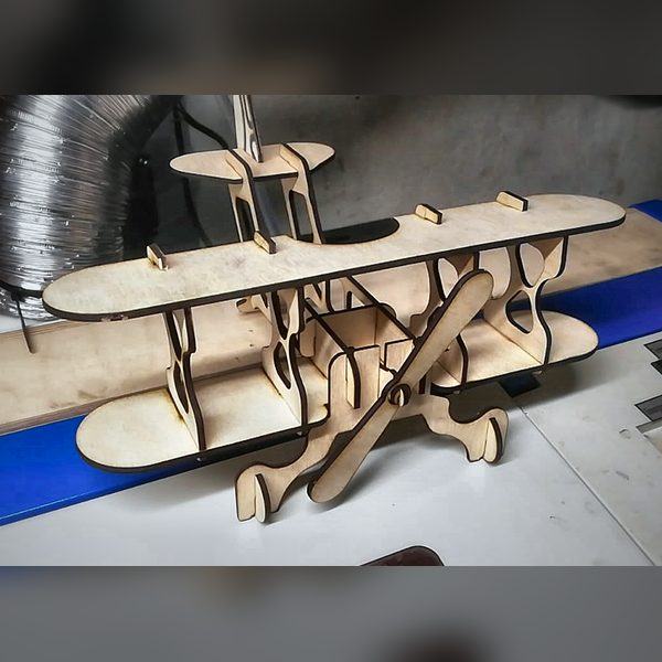 Laser-cut plywood biplane model
