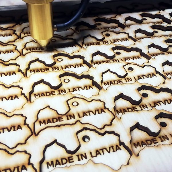 “Made in Latvia” tags in a batch — engraved and cut