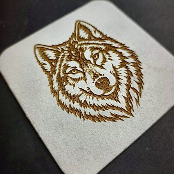 Coaster — engraved wolf