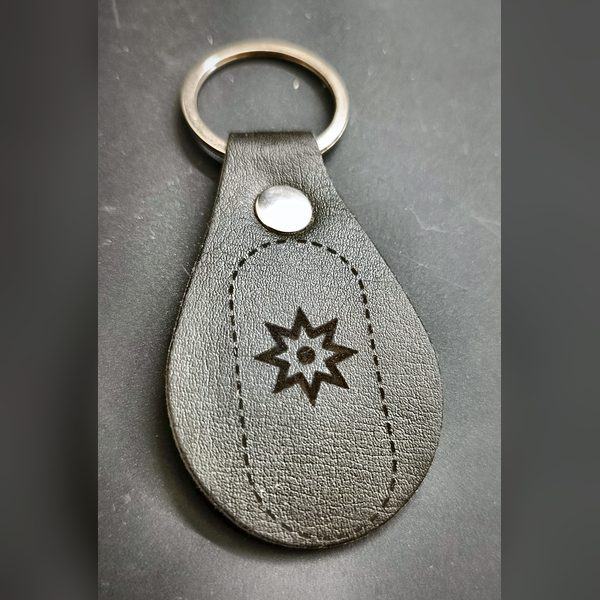 Black key ring — Auseklis star